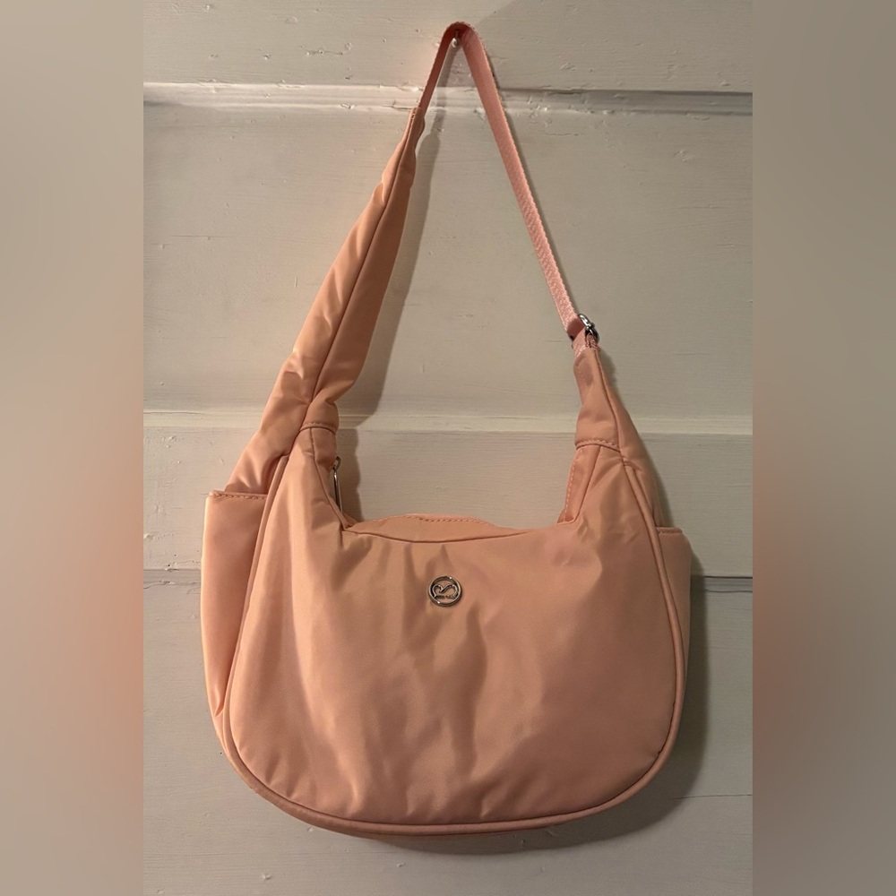 Pink puffer shoulder bag